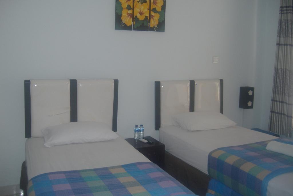 Mustika Inn Kuta Lombok Værelse billede